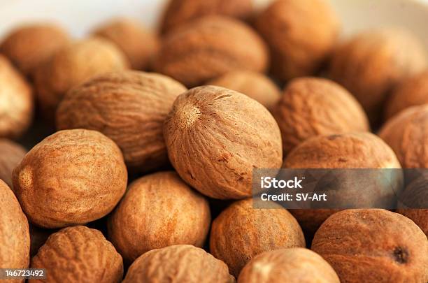 Closeup Background Image Of Nutmeg Stock Photo - Download Image Now - Spice, Food, Horizontal