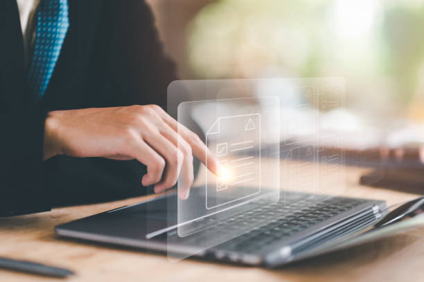 istock Businessman checking the steps through a virtual online document with a list of checkboxes Concepts of practices and policies, company articles of association Terms and Conditions 1467236680