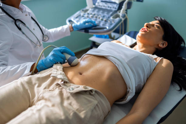 istock Pregnant woman having ultrasound 1467241376
