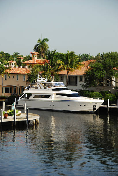 Yacht at Waterfont Mansion stock photo