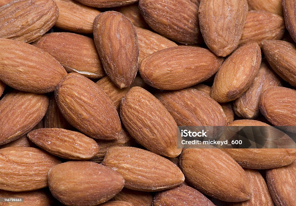 Almonds Close Up Close up of almonds suitable for a background Almond Stock Photo
