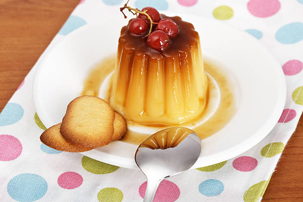 istock Cream caramel dessert with red currants and cookies 146724540