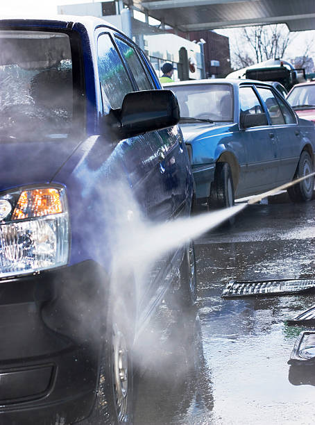 istock Automatic car wash washing a blue SUV  146724560