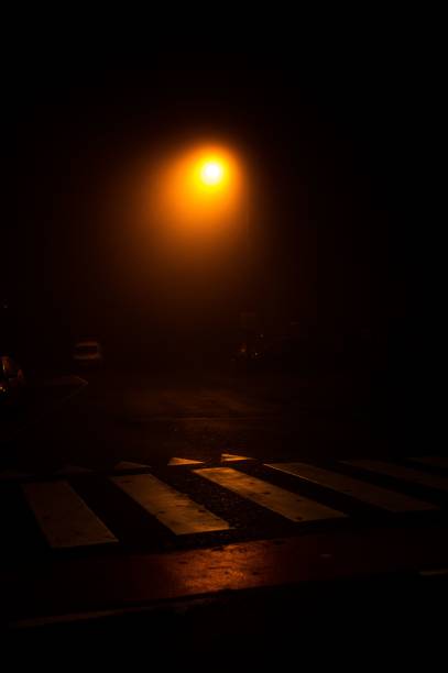 istock Vertical shot of the zebra cross illuminated at night. 1467247822
