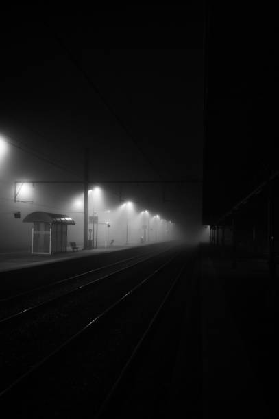 istock Grayscale shot of the empty illuminated platform at night. Essen, Germany. 1467248362