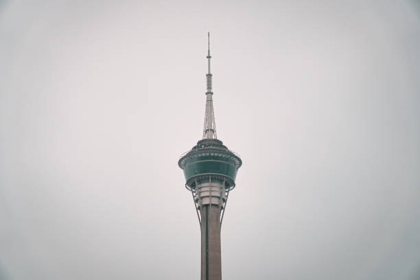 istock Top of the Macau tower on a light gray sky background 1467251078