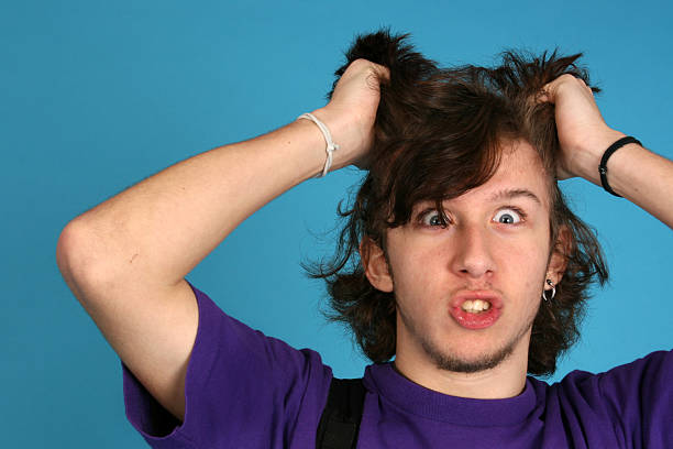 istock Teen pulling his hair out 146725157