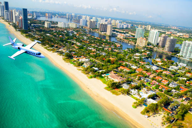 istock Airplane flying to Miami. 1467251929