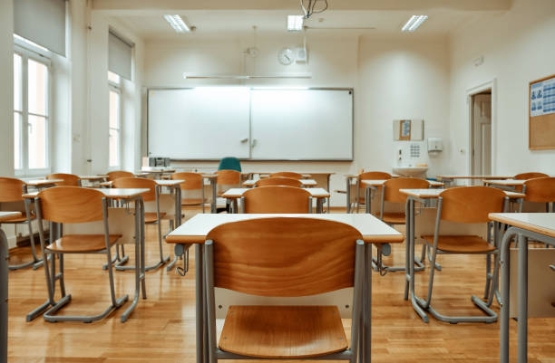 istock Whiteboard on the wall of an empty classroom 1467255820