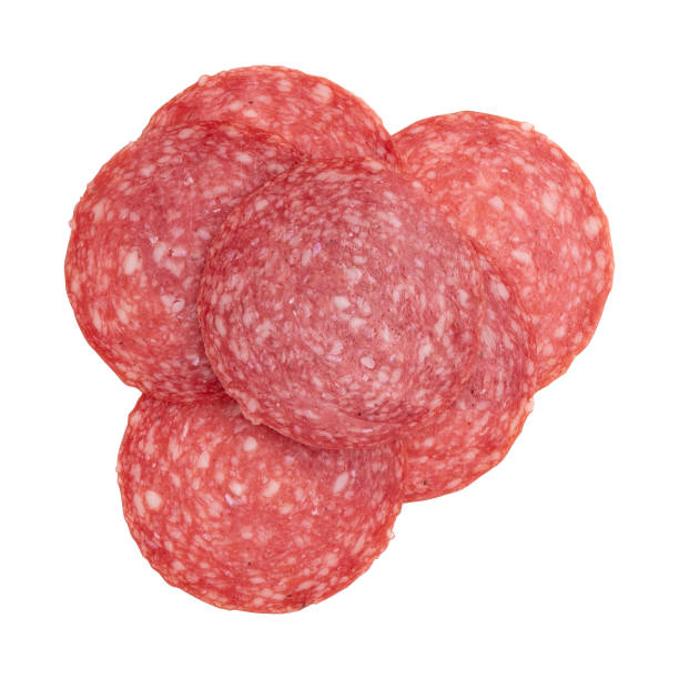 istock salami sausage cut into pieces isolated on white 1467256733