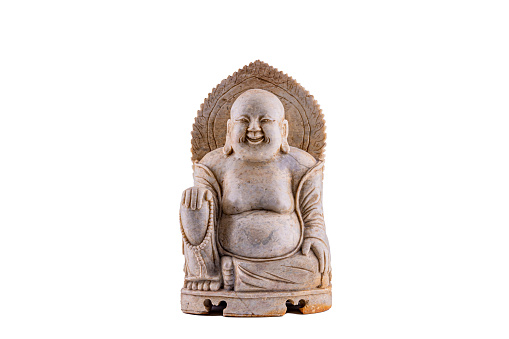 A closeup of a Hotei god statue isolated on white