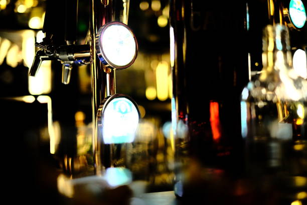 istock Glass of drink on dark background 1467258364