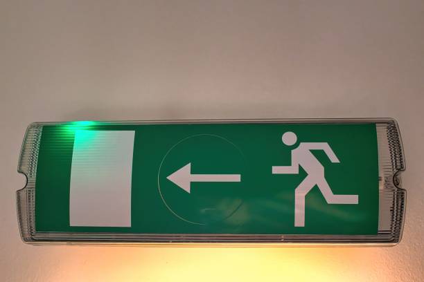istock Closeup of an emergency exit sign on the wall 1467263250