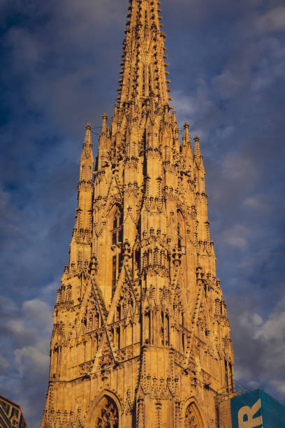 This picture captures the grandeur and beauty of the iconic St. Stephen's Cathedral, one of Vienna's most cherished landmarks. The intricate Gothic architecture, towering spires and stunning stained-glass windows make this cathedral a must-see for visitors to the Austrian capital. From the intricate details of the façade to the breath-taking views from the top, this image showcases the full majesty of St. Stephen's Cathedral and is sure to capture the attention of anyone looking for a stunning visual representation of this magnificent structure.
