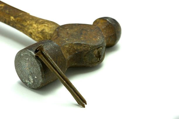 istock Old ball peen hammer and nails 146726453