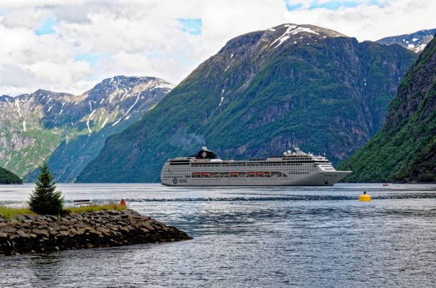 MSC Lirica Cruise ship in Norwegian Fjords - Geiranger fjord - Hellesylt, Sunnylvsfjord, Norway, Scandinavia. Travel destination Norway. 02.07.2012