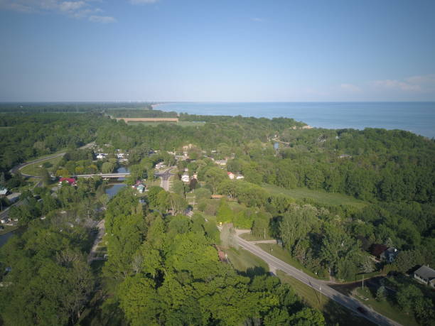 istock Aerial view of village surrounded by dense trees 1467266241