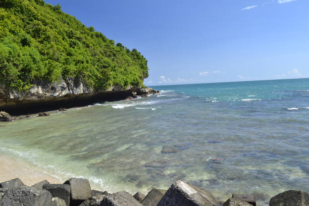 istock Beautiful beach and calm sea water 1467268181