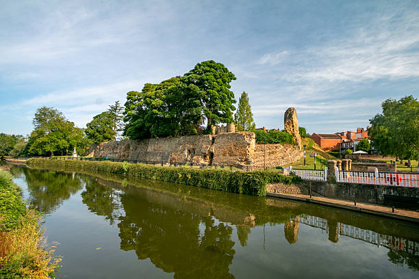 Tonbridge Castle is a well-preserved motte-and-bailey Norman castle in Kent, founded in the late 11th century by Richard Fitz Gilbert shortly after the Norman Conquest. Its standout feature is the great stone motte, one of the largest surviving in England, topped by a 12th-century shell keep.
