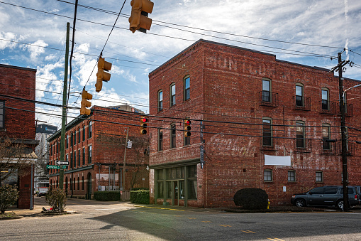 Montgomery, Alabama, USA-February 7, 2023: Historic brick buildings on North Court Street in downtown Montgomery most of which were built circa 1900-1915.