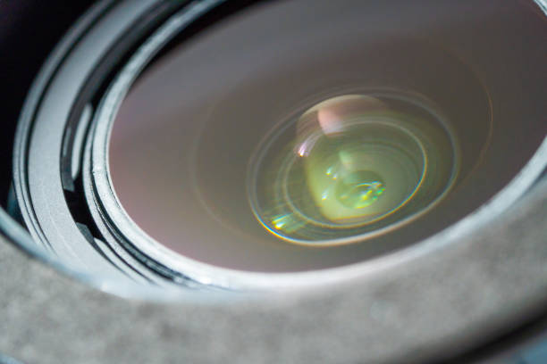 istock Close up beautiful camera lens with colorful background reflection. 1467272704
