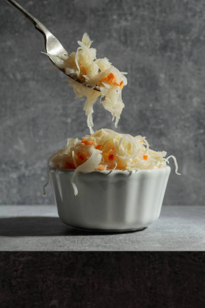 istock Bowl of sauerkraut with a carrot. 1467272736