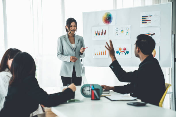 istock Business people proficiently discuss work project while sitting in circle . Corporate business team collaboration concept . 1467274177
