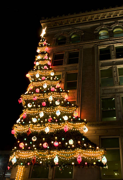 istock Christmas tree on city building 146727590
