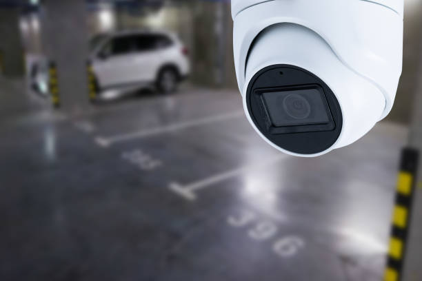 istock CCTV camera or surveillance system on indoor car parking. 1467276065
