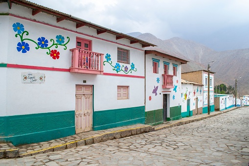 lima, Peru – February 15, 2023: Antioquia, a picturesque town with its colorful houses, an inspiration of the artist Enrique Bustamante.
