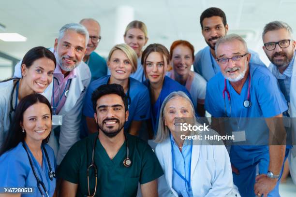 Portrait Of Happy Doctors Nurses And Other Medical Staff In Hospital Stock Photo - Download Image Now
