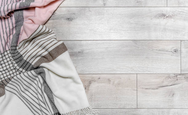 istock Warm blanket on the background of the laminate. 1467280749