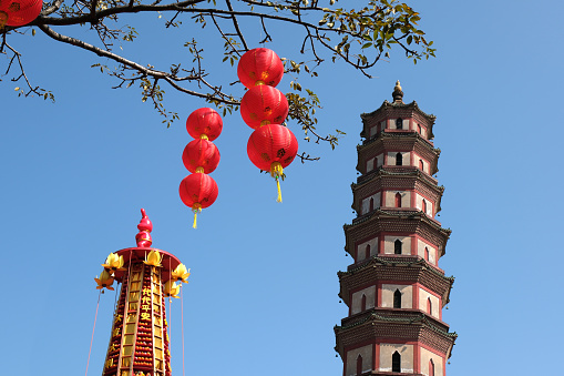 Buddhist pagoda and red lantern