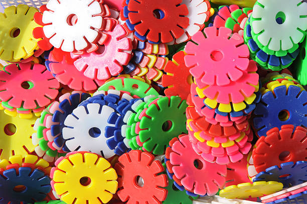 istock The plastic gear wheels of different contrast colors 146728396