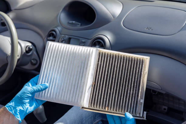 istock Replacing cabin pollen air filter for a car 1467284042