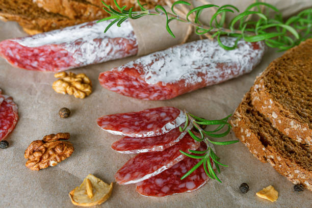 Appetizing sausage in a beautiful still life. Delicious and natural products.