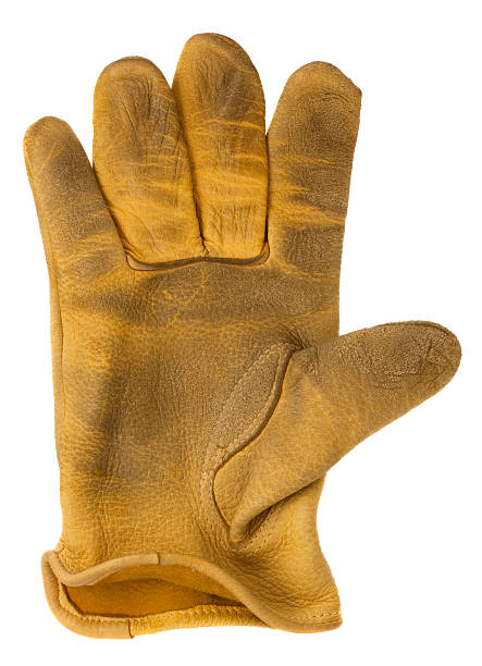 istock worn out yellow leather glove 146728732