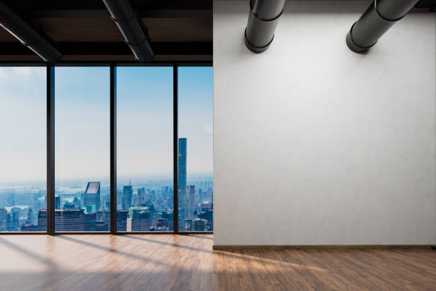 istock large office with blank white wall and copy space in front of panoramic window skyline view, wooden parquet floor; 3D Illustration 1467288405