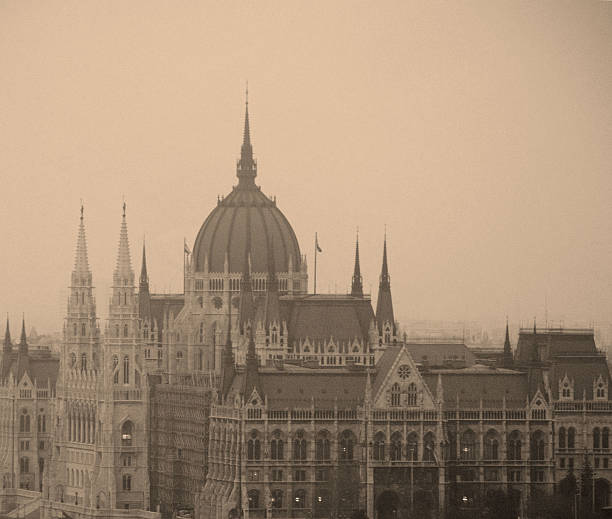 fog above parliament stock photo