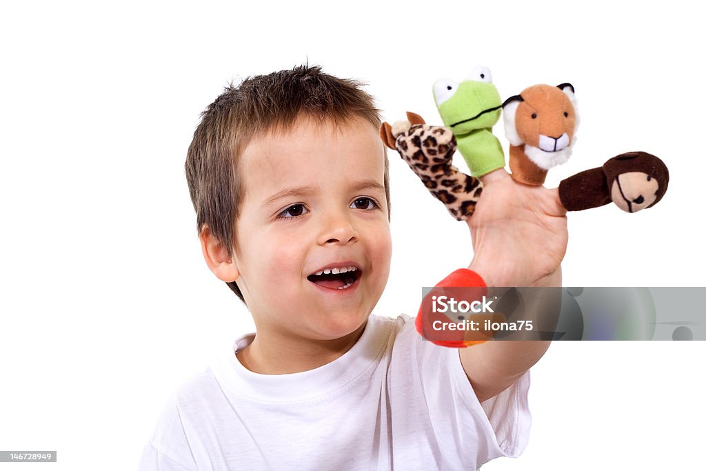 Happy boy with finger puppets Happy boy playing with finger puppets - isolated Finger Puppet Stock Photo