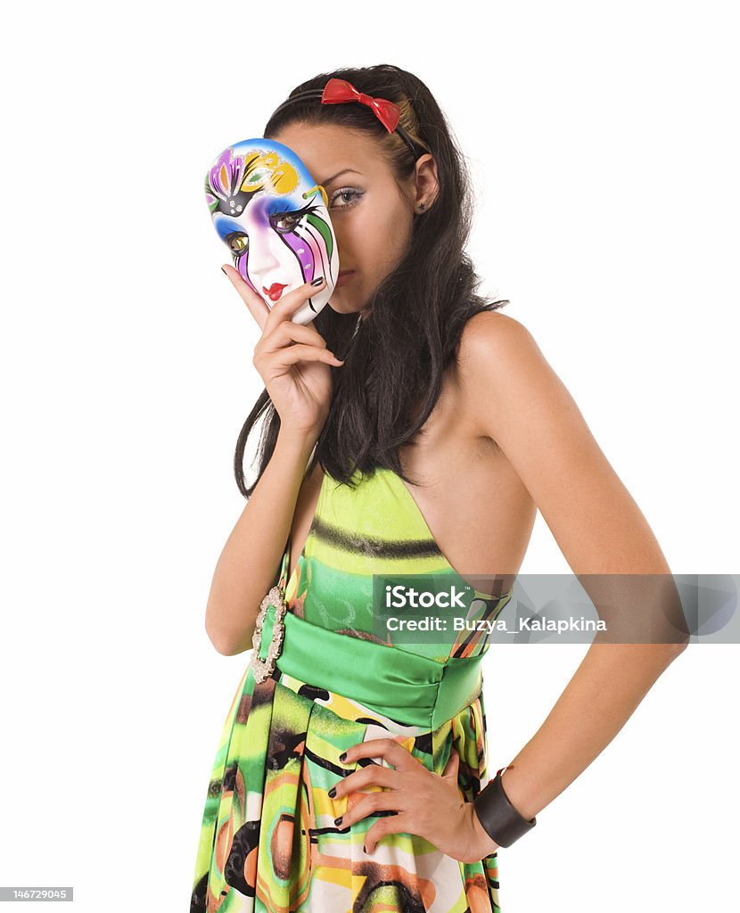 actress beautiful woman hold mask in hand over white Actress Stock Photo