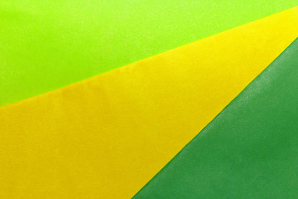Three color, geometric, abstract green, yellow and light green colorful minimal textures of paper, background. This Season's Fashion Colors stock photo