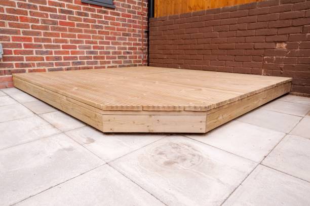 istock Newly built wooden deck in back garden. 1467293515