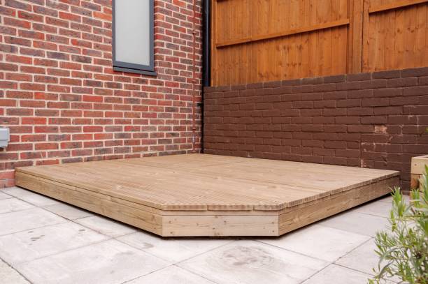 istock Newly built wooden deck in back garden. 1467293518