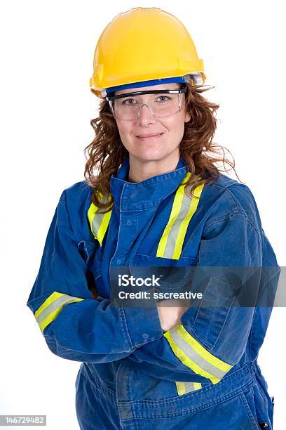 Photo libre de droit de Femme Travailleur De Sécurité banque d'images et plus d'images libres de droit de Casque - Casque, Femmes, Fond blanc