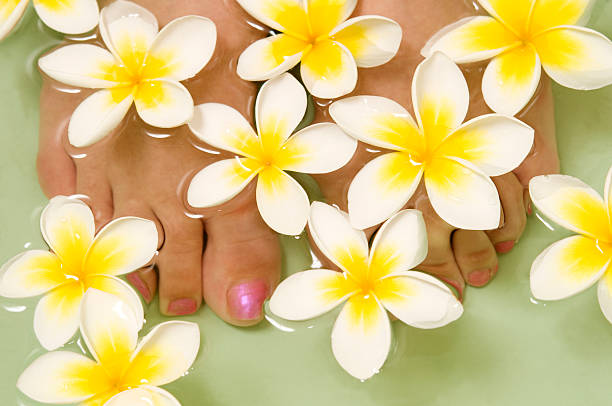 Feet in water stock photo