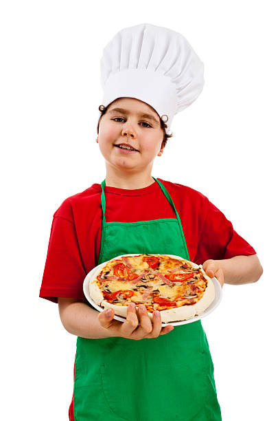 istock Young chef holding pizza isolated on white 146730088