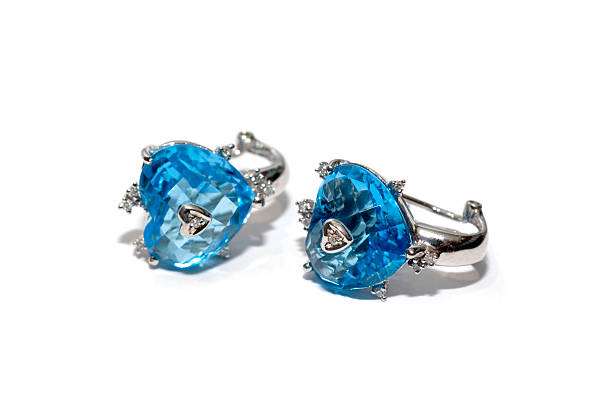 istock Pair of earrings isolated on the white background 146730134
