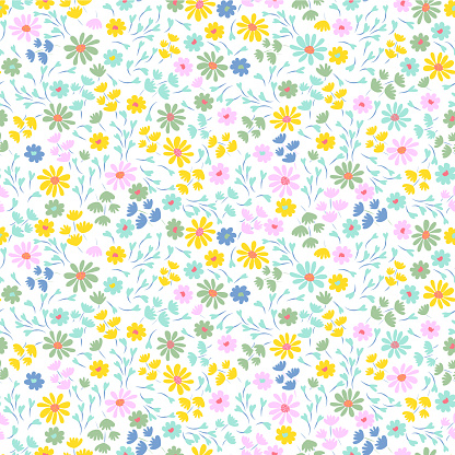 Floral pattern with small colorful cute flowers on a white background. Vintage pastel color pretty yellow, pink, blue tiny flowers. Ditsy print design