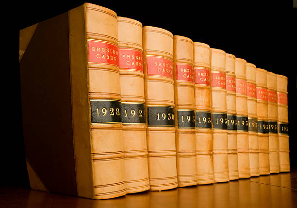 istock Many law books on a shelf in a office 146731014